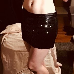 Black sequin mini skirt
